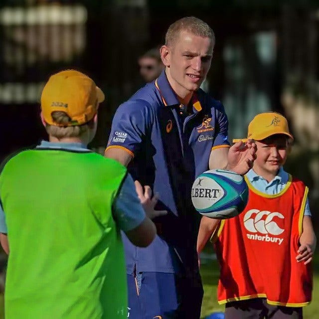 Wallabies rugby players during their school visit