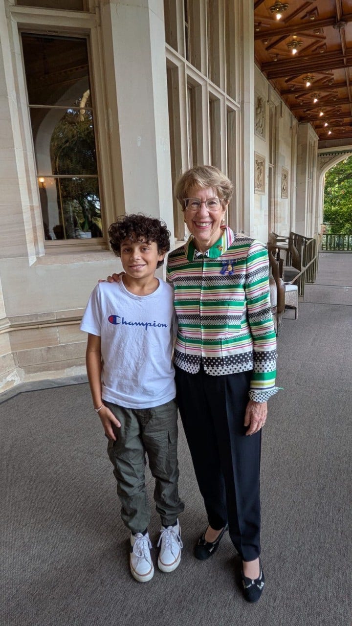 A photo of blake standing with the governor