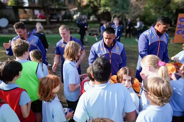 Wallabies rugby players during their school visit