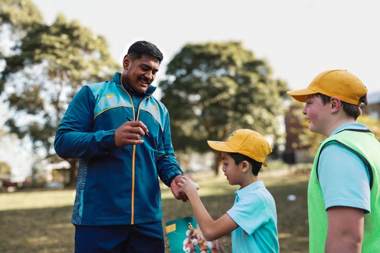 Wallabies rugby players during their school visit