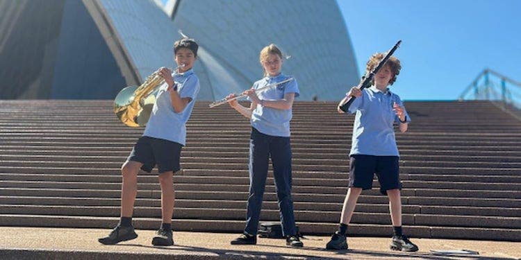 students on the steps of the opera house